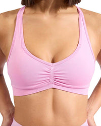 Pink ORU HALTER SPORTS BRA with sweetheart neckline and adjustable removable straps for light to medium support