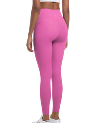 Rear view of woman wearing pink ORU Smooth Leggings with high waistband and pocket