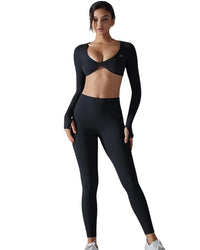 Woman wearing black ORU Everyday Leggings with high-waist, seamless, breathable, and stretchy gym wear.
