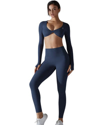 Woman wearing navy blue ORU Everyday Leggings and matching crop top in seamless, high-waist, breathable gym wear