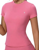 Pink ORU FITTED TOP with round neckline, slim fit, quick-dry, lightweight, and stretchy fabric for active performance